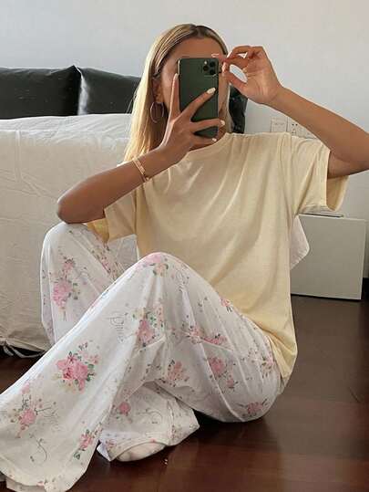 Livesso Women's Solid Color Round Neck Short Sleeve Top And Floral Print Long Pants Pajama Set