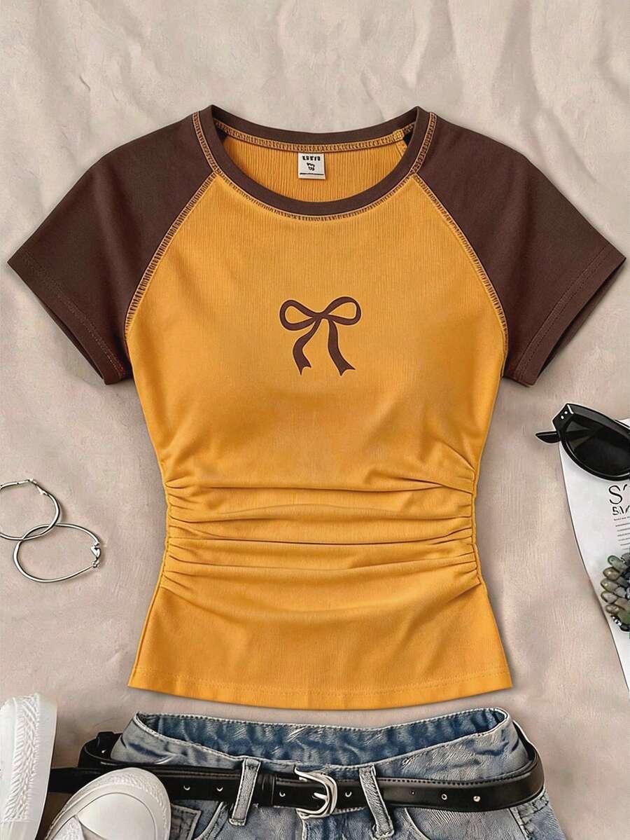 SHEIN 兒童青少年女孩春夏黃色棕色針織圓領插肩袖拼色蝴蝶結印花抽褶腰休閒街頭極簡風上衣T恤 - 彩色 - 查看 1