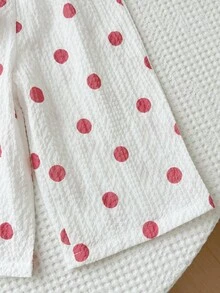 SHEIN Conjunto de top sin mangas con volantes en el bajo y pantalones con estampado de lunares y decoración de lazo para niña bebé - Rosa - Ver 5