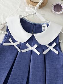 SHEIN 2件組女孩學院風套裝，無袖彼得潘領上衣 + 搭配短褲，藍白配色，乾淨清新，可愛活潑風格，適合日常出遊、遊樂園、聚會、親子活動，春/夏季 - 藍色 - 查看 8