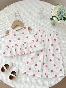 SHEIN Conjunto de top sin mangas con volantes en el bajo y pantalones con estampado de lunares y decoración de lazo para niña bebé - Rosa - Ver 2
