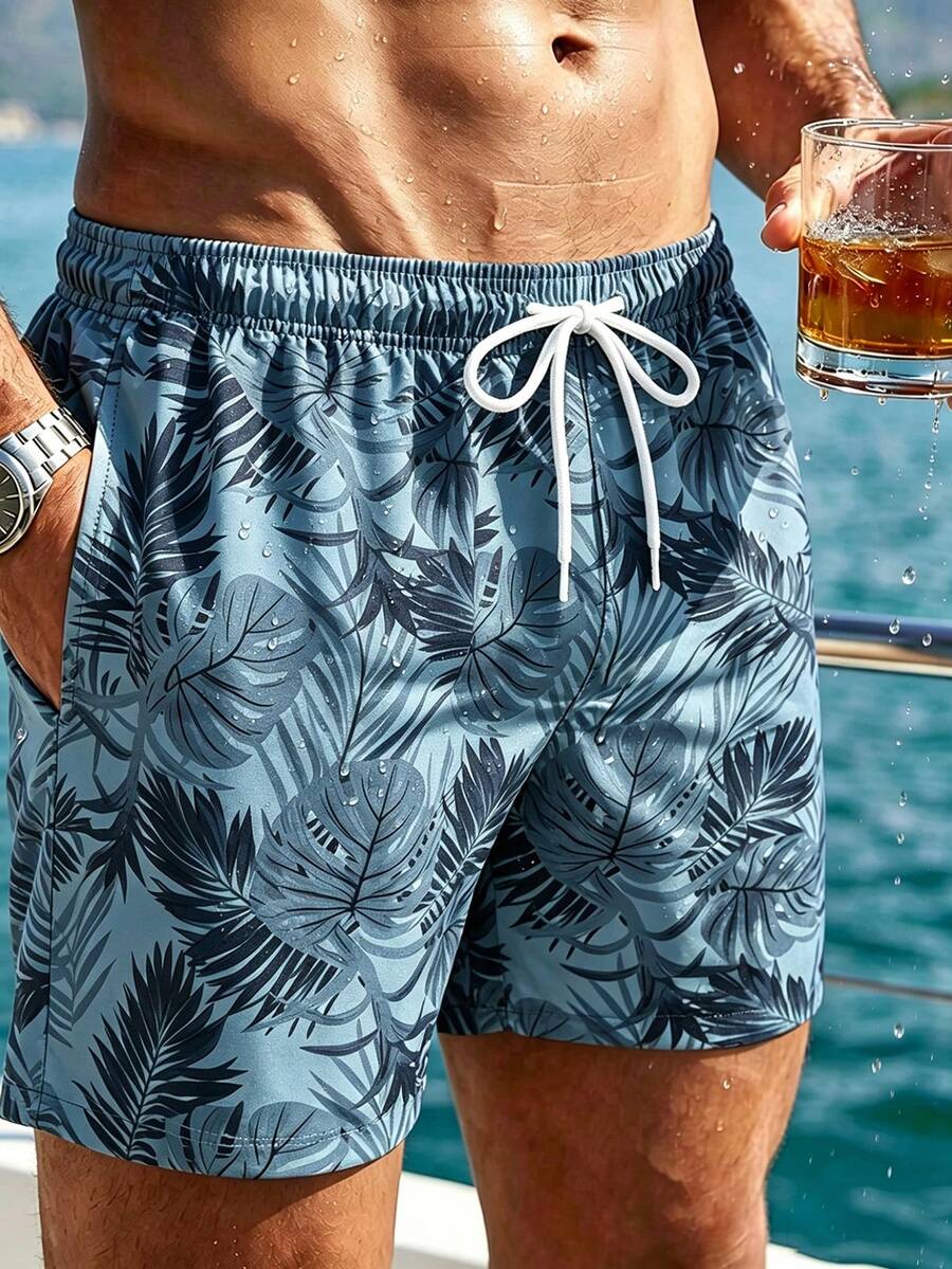 Manfinity Swimmode Shorts de playa con cordón en la cintura y estampado de plantas tropicales para hombre talla grande - Gris - Ver 1