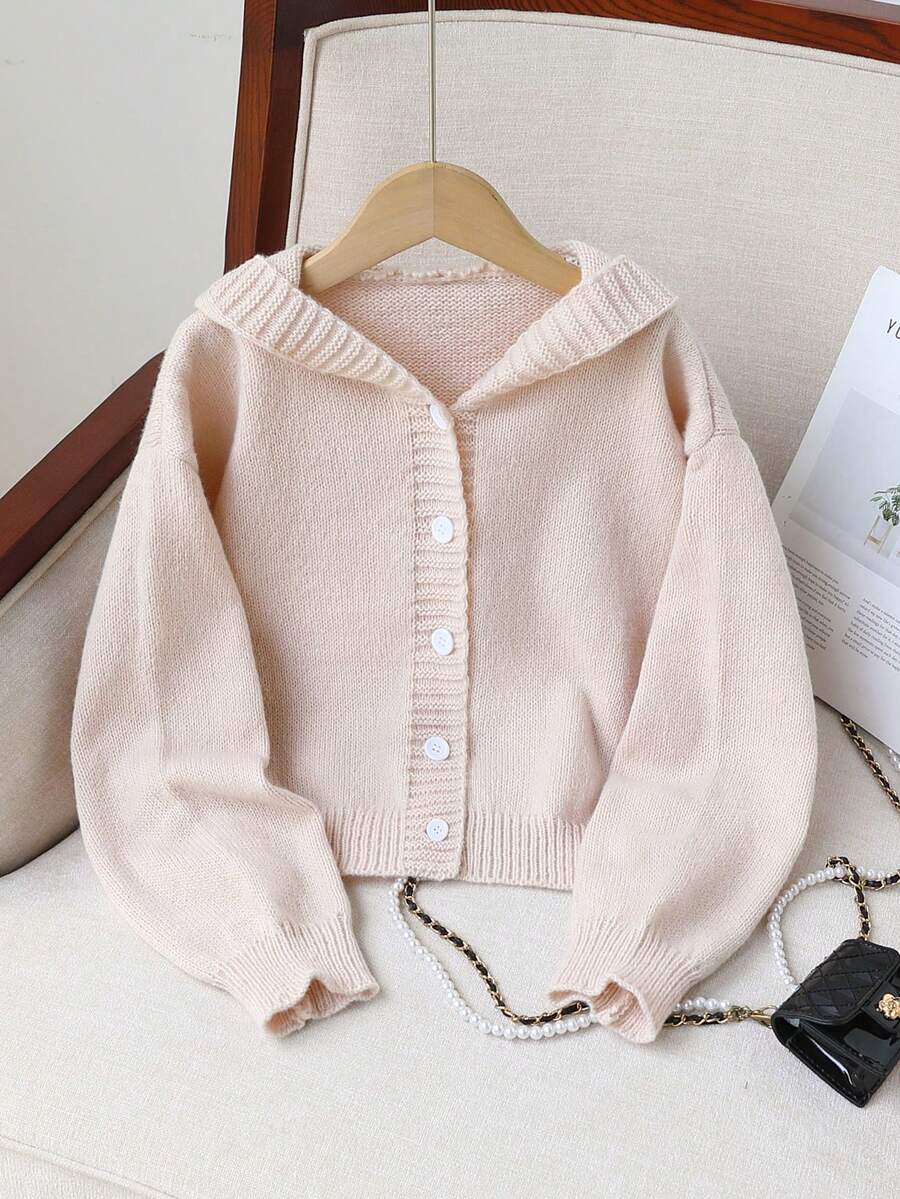 SHEIN Genkimix Kids 1件女童連帽開襟針織外套,時尚百搭極簡純色,休閒寬鬆版型,前襟直排鈕扣,適中厚度,整齊下擺,緊口袖口,觸感光滑柔軟親膚,適合日常穿著、居家、上學、外出,秋冬款 - 杏色 - 查看 1