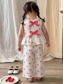 SHEIN Conjunto de top sin mangas con volantes en el bajo y pantalones con estampado de lunares y decoración de lazo para niña bebé - Rosa - Ver 4