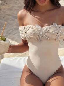 Bonvoyette 2026 New Women's Summer Beach Vacation Ruched Off-Shoulder Backless Sexy Floral & Pearl Embellished Solid Color One-Piece Swimsuit - Apricot - View 1