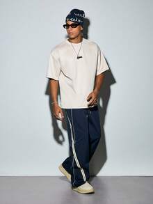 Modcrash 1pc Fashionable Sporty Casual Straight Leg Loose Wide-Leg Pants, Featuring Stylish Ribbed Tape Inserts, Contrast Binding Design, Lightweight Polyester Fabric, Suitable For Gym Wear And Gift - Navy Blue - View 3