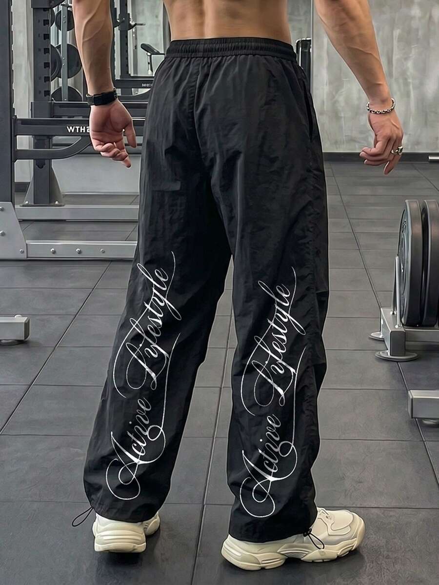 GymBeat Men's Letter Print Sports Long Pants - Black - View 1