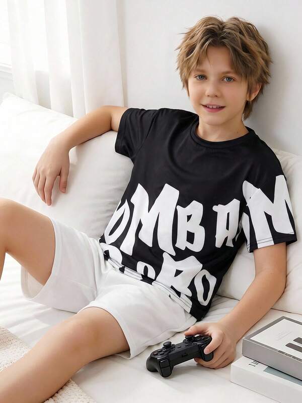 SHEIN Dozemod Kids Tween Boy Minimalist Soccer Graphic Round Neck Short Sleeve Shorts Loose Casual Loungewear Pajama Set 2pcs