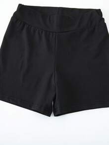 SHEIN Conjunto de pantalones cortos deportivos para niñas jóvenes, diseño con volantes y espalda descubierta, lazo cruzado multicapa con huecos en la espalda, pantalones cortos de cintura alta, top corto ajustado, adecuado para danza, fitness, actuaciones, uso diario al aire libre, atuendo casual - Negro - Ver 11