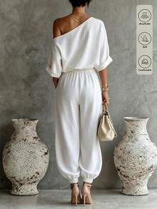SHEIN Holidaya Women's Spring/Summer Slouchy Textured Asymmetric Shoulder Casual 2 Pieces Set, Featuring Asymmetric Shoulder Design With Loose Drop Shoulder Short Sleeve Top And High-Waist Elastic Cuffed Lantern Pants, Textured Fabric In Matching Color For A Relaxed Vibe, Versatile Outfit For Daily Commute, Casual Outings, Home Wear And More - White - View 2