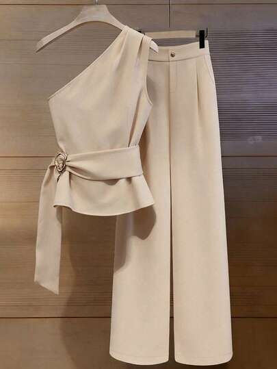 Franclia Conjunto de 2 peças elegante e fashion, composto por top com ombro assimétrico e cinto metálico na cintura, e calça reta e solta para o verão