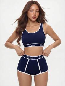Rina Fox Set de lencería deportiva con sujetador de bloques de color y ribete de contraste y boxers cortos para yoga - Azul - Ver 5