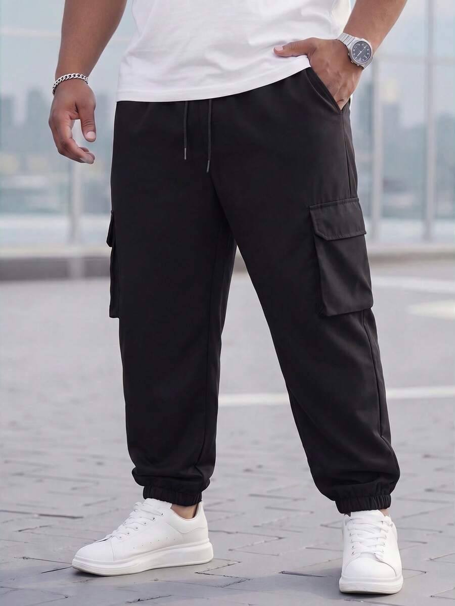 Manfinity Homme 男士加大码纯色工装裤,带抽绳下摆和口袋,外出纯色长款休闲裤黑色裤子,适合丈夫、男朋友的礼物黑色工装裤黑色工装裤男士黑色宽松裤男士裤子黑色,适合秋季 - 黑色 - 查看 1