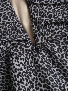 Elamini Women's Elegant Leopard Print Ruffle Hem Vacation Style Mini Skirt - Black - View 3