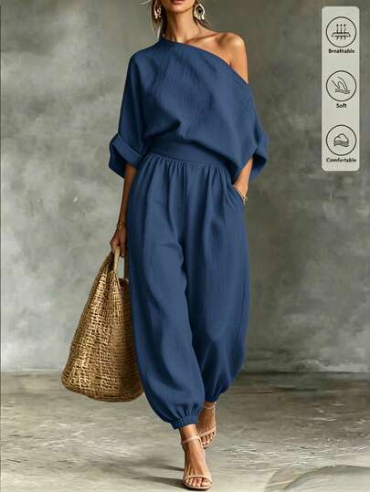 SHEIN Women's Spring/Summer Slouchy Textured Asymmetric One-Shoulder Casual 2-Piece Set, Featuring Asymmetric One-Shoulder Design With Loose Drop-Shoulder Short Sleeve Top And High-Waist Elastic Cuffed Lantern Pants, Same-Color Textured Fabric Creates A Relaxed Atmosphere, Versatile Outfit For Casual Wear, Daily Commute, Leisure Travel, Home And More, Women's Asymmetric One-Shoulder Casual 2-Piece Set, Textured Loose Fit Set, Asymmetric Design Top + Cuffed Pants, Slouchy Summer Set