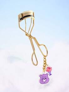 SHEIN X Care Bears 卡通熊飾品睫毛夾，鍍金睫毛夾附可愛壓克力吊飾，便攜式睫毛夾可打造自然持久捲翹，適合日常化妝與旅行使用 - 金色 - 查看 1