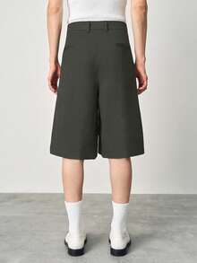 STYNVO Pantalones capri de moda para hombre de unicolor con pliegues, botones y bolsillos - Verde Oscuro - Ver 2