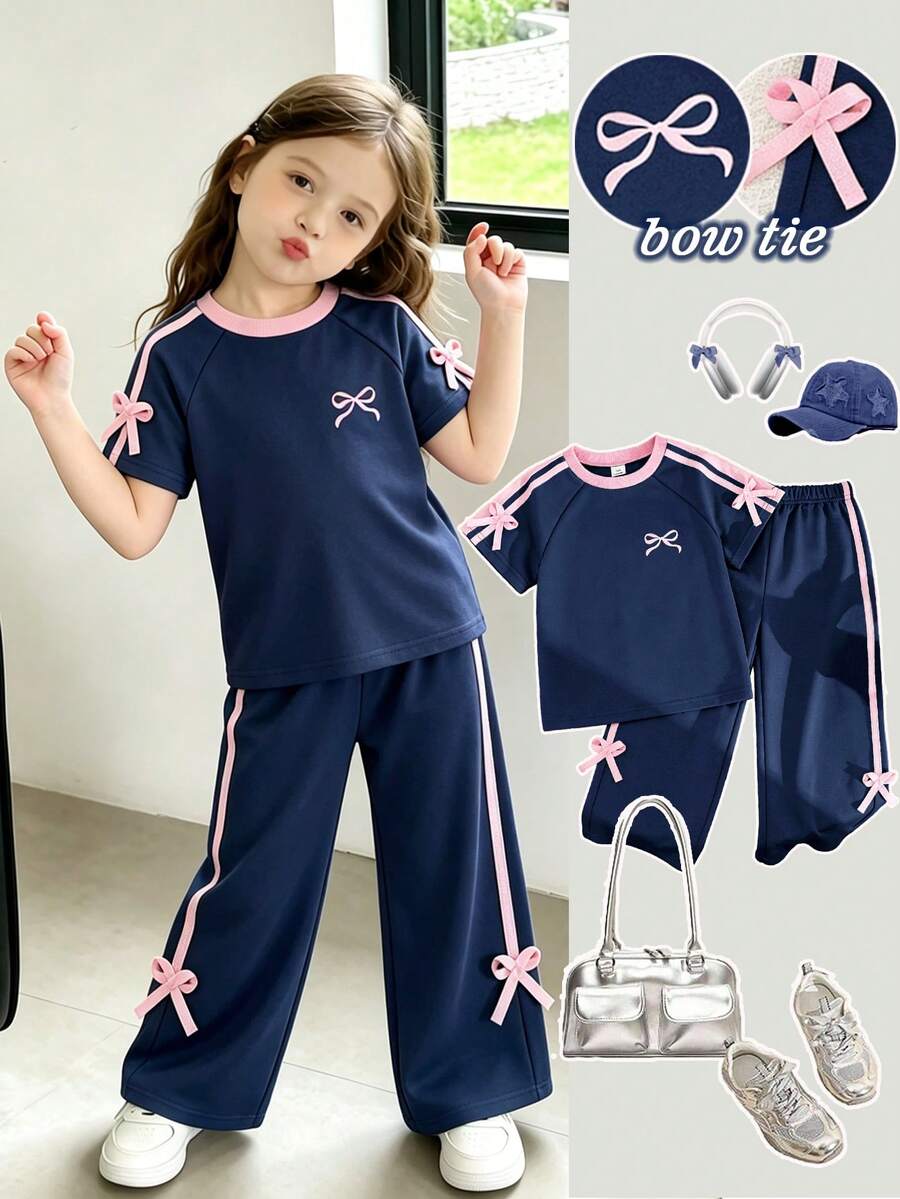 SHEIN Playful Pals 女童春夏休閒新款T恤套裝,雙條紋袖口搭配3D蝴蝶結裝飾,圓領落肩袖T恤上衣,搭配休閒長褲,2件套,適合日常穿著、上學、外出、度假、運動、派對、節日,春夏穿搭 - 藏蓝色 - 查看 1