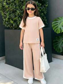 Elladie kids Jungmädchen Frühling/Sommer Lässig Mode Neues T-Shirt Set, geripptes Rundhals Raglanärmel T-Shirt Top mit einfarbiger lässiger langer Hose 2-teiliges Set, geeignet für Kleine Mädchen, amerikanischer Vintage, Premium minimalistisch, lässig bequem süß cool Outfit, geeignet für tägliches Tragen, Schule, Ausflüge, Urlaub, Sport, Partys, Feiertage, Frühling/Sommer - Aprikosenfarben - Übersicht 1
