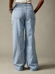 MISSGUIDED Jeans de pierna ancha de tiro bajo de denim rígido con detalles de tachuelas metálicas laterales - Lavado ligero - Ver 2