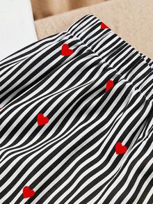 SHEIN Elladie kids 女童春夏休閒時尚新款T恤套裝，正面美式復古數字圖案印花，羅紋圓領，插肩袖T恤上衣搭配休閒長褲，2件套，適合女童美式復古高端極簡休閒舒適甜酷穿搭，適用日常穿著、上學、外出、度假、運動、派對、節日，春夏 - 黑與白 - 查看 5