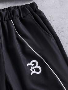 Coolqubz 青少年男孩美式街頭風運動梭織布連帽夾克，彈性下擺與袖口，對比色拼接前胸配抽繩與字母印花圖案，搭配彈性腰梭織布寬鬆長褲，舒適適合春秋日常通勤、外出、聚會、攝影與街頭運動 - 黑色 - 查看 7