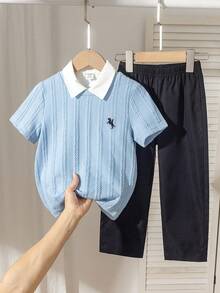 2pcs/Set Boys Outfit, Textured Navy Blue Knit Sweater With Small Black Embroidered Pattern On Left Chest, Khaki Pants, Suitable For Commuting, Casual Wear, Spring/Summer - Multicolor - View 1