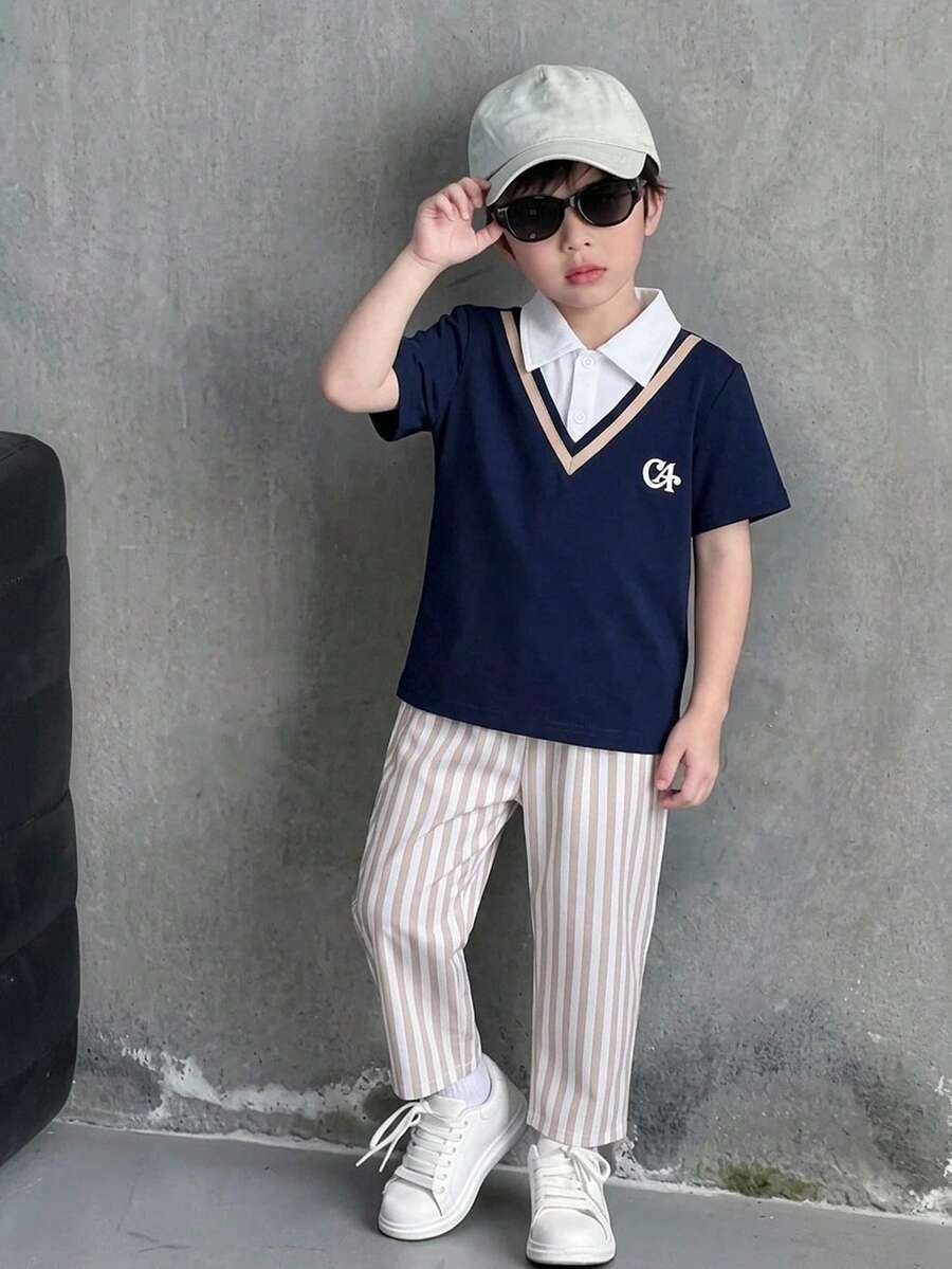 Casuvi Kids طقم صبي صغير من قطعتين، قميص بولو محبوك مريح بأكمام قصيرة 2 في 1 للأطفال، أنيق وعصري مع تفاصيل نمط صغير لإضافة الرقي، مقترن ببنطال طويل كاجوال باللون الكاكي، تصميم خصر مرن، قصة فضفاضة، مناسب لمختلف مناسبات الخريف مثل العطلات والخروجات اليومية وغيرها. - متعدد الألوان - مشاهدة 1