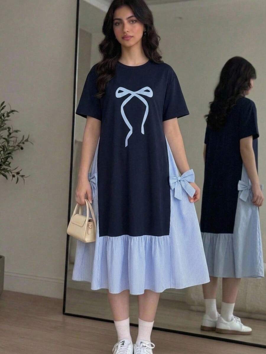 SHEIN 兒童青少年女孩海軍藍條紋拼接蝴蝶結洋裝，圓領短袖，海軍藍主體搭配側邊條紋拼接，胸前大蝴蝶結印花與側邊蝴蝶結裝飾，溫柔通勤風女裝，春秋日常街頭穿搭，小眾設計蛋糕裙 - 藏蓝色 - 查看 1