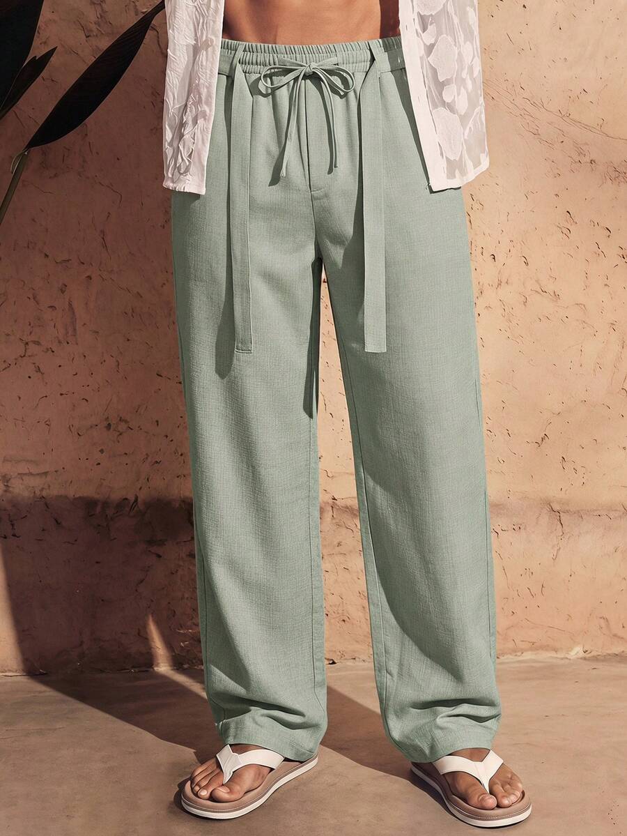HIMLAND Men's Solid Color Waist Tie Pocket Wide Leg Loose Long Pants - Multicolor - View 1