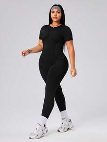 SHEIN Rhythm Era Spring Summer Plus Size Women's Sports Jumpsuit, Round Neck Short Sleeve, Front Split Seam, Back Cutout With Buckle, 9/10 Length, Black, Slim Fit - Black - View 4
