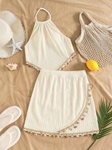 SHEIN Girls' Bohemian Two Pieces Vacation Set In Soft Off-White, Crafted From Crinkled Textured Fabric. Consisting Of A Halter Camisole And A Bodycon Short Skirt, It Is Decorated With Delicate Shell Pendants On The Hems. Full Of Tropical Island Charm, This Outfit Creates A Strong Holiday Vibe, Ideal For Seaside Trips And Vacation Wear - Apricot - View 5