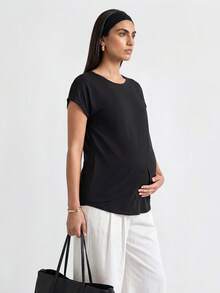 Modmama 孕婦純色圓領短袖哺乳上衣 產後夏季孕婦哺乳衣 花卉白色簡約基本款 - 黑與白 - 查看 4