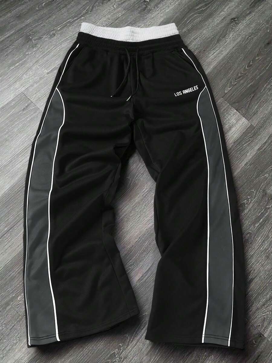 Manfinity Roghcode Pantalones de chándal casuales para hombre con estampado de letras, cintura con cordón y bloques de color - Multicolor - Ver 1