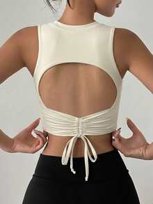 DAZY Women's Sleeveless Solid Color Ruched Back Hollow Out Sports Bra With Padded Cups - Beige - View 1