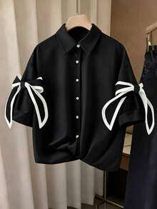 Resyla Camisa Casual Feminina com Detalhe de Laço Abotoamento Simples - Preto - Visão 1