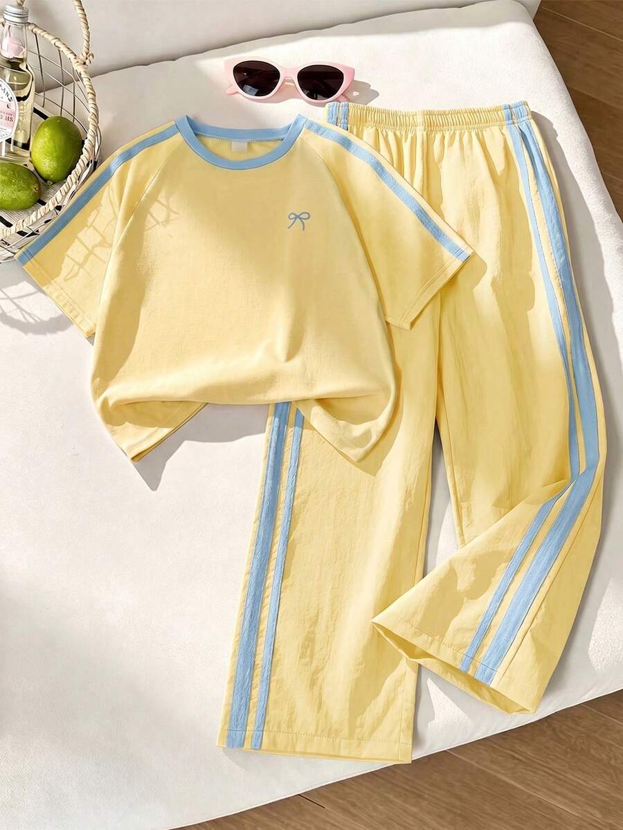 SHEIN 青少年女孩 T-Shirt 套裝,運動風,粉色與深綠色拼接短袖 T-Shirt 和短褲套裝,夏季寬鬆貼身設計,輕量面料,適合日常穿著、休閒運動或搭配穿搭 - 黃色 - 查看 1