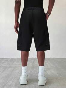 STYNVO Pantalones cortos cargo casuales de uso diario para hombre de talla grande, unicolor, con cintura de cordón y bolsillos - Negro - Ver 2