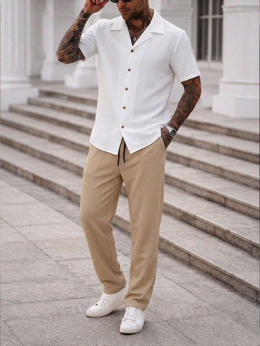 Manfinity Homme 男士成熟休閒泡泡皺紋紋理短袖襯衫與寬鬆直筒長褲2件套,春夏風格,舒適柔軟面料,適合日常休閒、度假旅行、戶外活動,也是送給男朋友或丈夫的理想禮物 - 彩色 - 查看 1