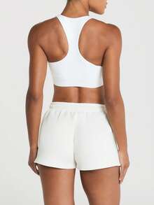 11SKNDS Glideform Racerback Sports Bra With Scoop Neck Seamless Slip-On Design And Logo Detail For Active Training - White - View 3