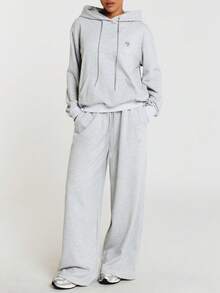 11SKNDS Oversized Pullover Hoodie With Drawstring Hood Centre Pocket Ribbed Cuffs And Logo Detail Perfect For Casual Everyday Wear Fall Winter Layering - Grey - View 4