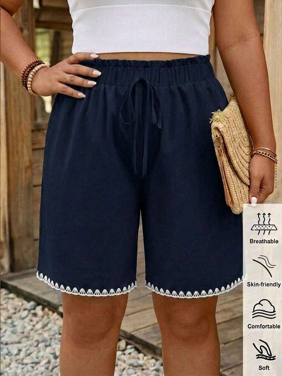 Comfylo Plus Size Women's Ruffle Hem Waist Tie Floral Trim Shorts - Navy Blue - View 1
