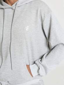 11SKNDS Oversized Pullover Hoodie With Drawstring Hood Centre Pocket Ribbed Cuffs And Logo Detail Perfect For Casual Everyday Wear Fall Winter Layering - Grey - View 5