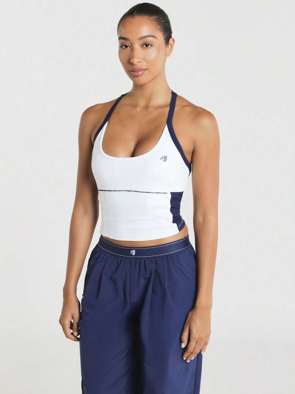 11SKNDS Sports Crop Tank Top With Racerback Straps Navy Color Block Side Panels Scoop Neckline Built-In Support Contrast Stitching Summer Active