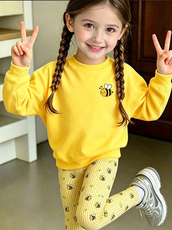 SHEIN 1 Conjunto de Sudadera y Pantalones para Niñas con Diseño de Abejita, Sudadera de Cuello Redondo con Estampado de Abeja Única en Amarillo Sólido y Pantalones Largos Ajustados con Estampado de Rayas Verticales Amarillas & Blancas en Todo el Diseño, Adecuado para Salidas, Compras, Uso Diario, Primavera, Otoño, Invierno