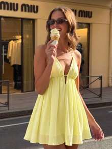 Aloruh Women's Sexy Solid Color Backless Halter Mini Dress Summer Golf Pale Yellow Brunch Vacation Going Out - Light Yellow - View 1