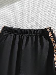 SHEIN Genkimix Kids 女童春夏休閒時尚新款T恤套裝，針織面料前胸豹紋蝴蝶結熱轉印圖案短袖T恤搭配豹紋織帶黑色長褲，2件套，適合女童，美式復古高端簡約休閒舒適甜酷穿搭，適合日常穿著、上學、出遊、度假、日常運動、參加派對、節日，春夏穿搭 - 黑色 - 查看 8