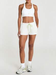 11SKNDS Glideform Racerback Sports Bra With Scoop Neck Seamless Slip-On Design And Logo Detail For Active Training - White - View 5