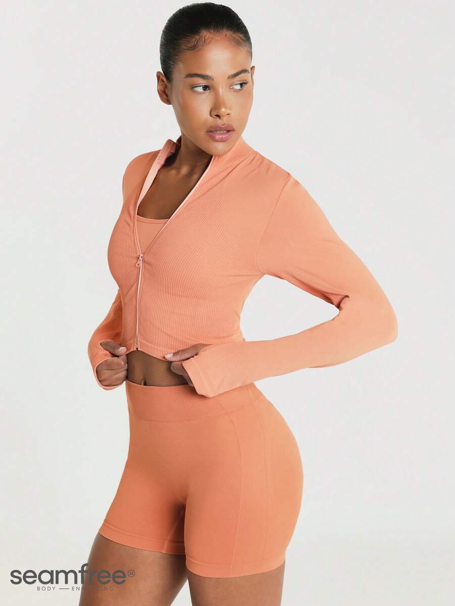 11SKNDS Ribbed Zip-Up Cropped Sports Jacket With Mock Neck Long Sleeves And Thumbhole Cuffs Slim Fit Activewear Layer For Spring Summer Gym - Orange - View 1