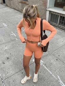 11SKNDS Ribbed Zip-Up Cropped Sports Jacket With Mock Neck Long Sleeves And Thumbhole Cuffs Slim Fit Activewear Layer For Spring Summer Gym - Orange - View 2